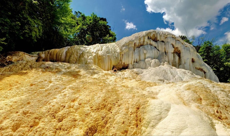 the quantity of and path the water takes down over the white whale changes often so the shape and look of the formation keeps offering new shapes and