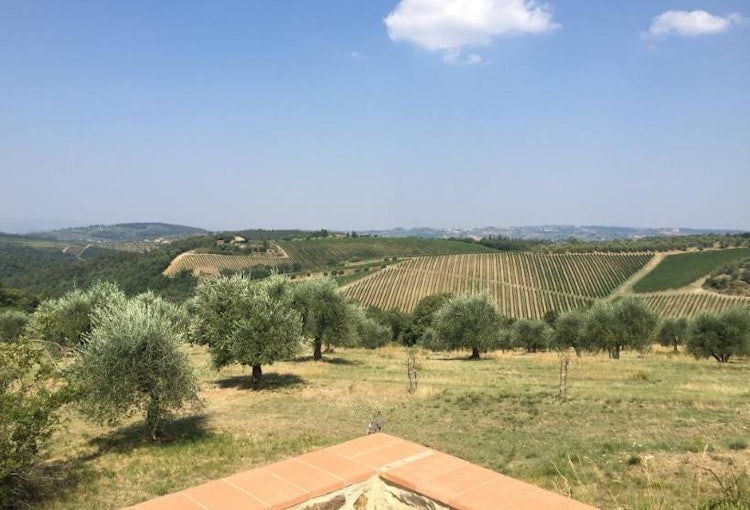 Podere Patrignone panoramic terrace vacation villa in Castellina in Chianti :: Discover Tuscany